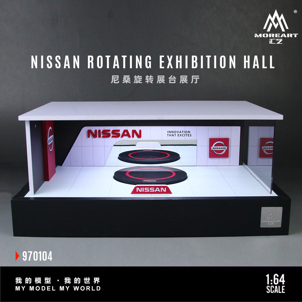 Model of a Nissan rotating exhibition hall with branding and scale information.