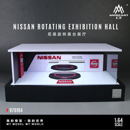 Model of a Nissan rotating exhibition hall with branding and scale information.