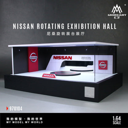 Model of a Nissan rotating exhibition hall with branding on a gray background