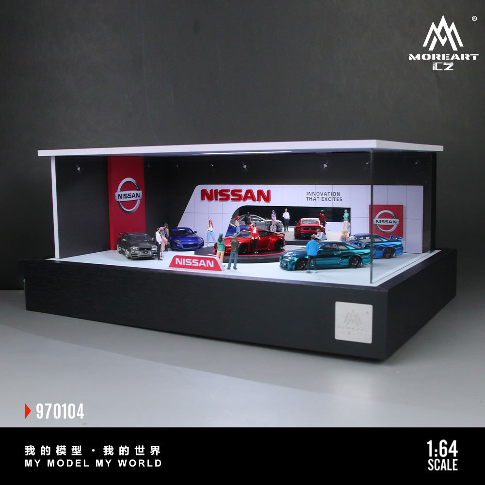 Model display case with Nissan cars and people, featuring the MoreArt ICZ brand.