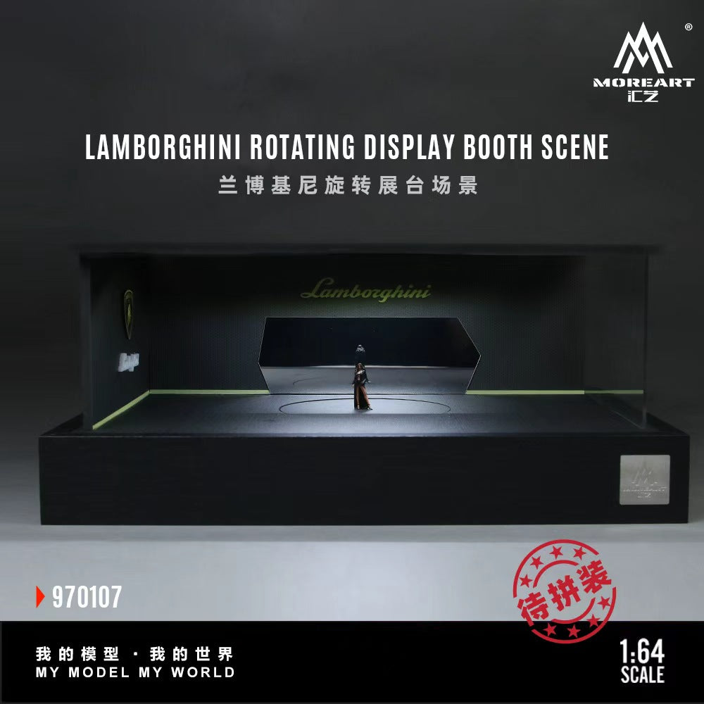 MoreArt 1:64 Lamborghini Rotating Display Booth Scene 970107, featuring a black Lamborghini-themed showroom diorama with illuminated display walls, Lamborghini branding, a central rotating display platform, and a modern exhibition booth design for 1:64 scale diecast model cars.