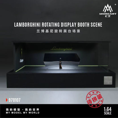 MoreArt 1:64 Lamborghini Rotating Display Booth Scene 970107, featuring a black Lamborghini-themed showroom diorama with illuminated display walls, Lamborghini branding, a central rotating display platform, and a modern exhibition booth design for 1:64 scale diecast model cars.
