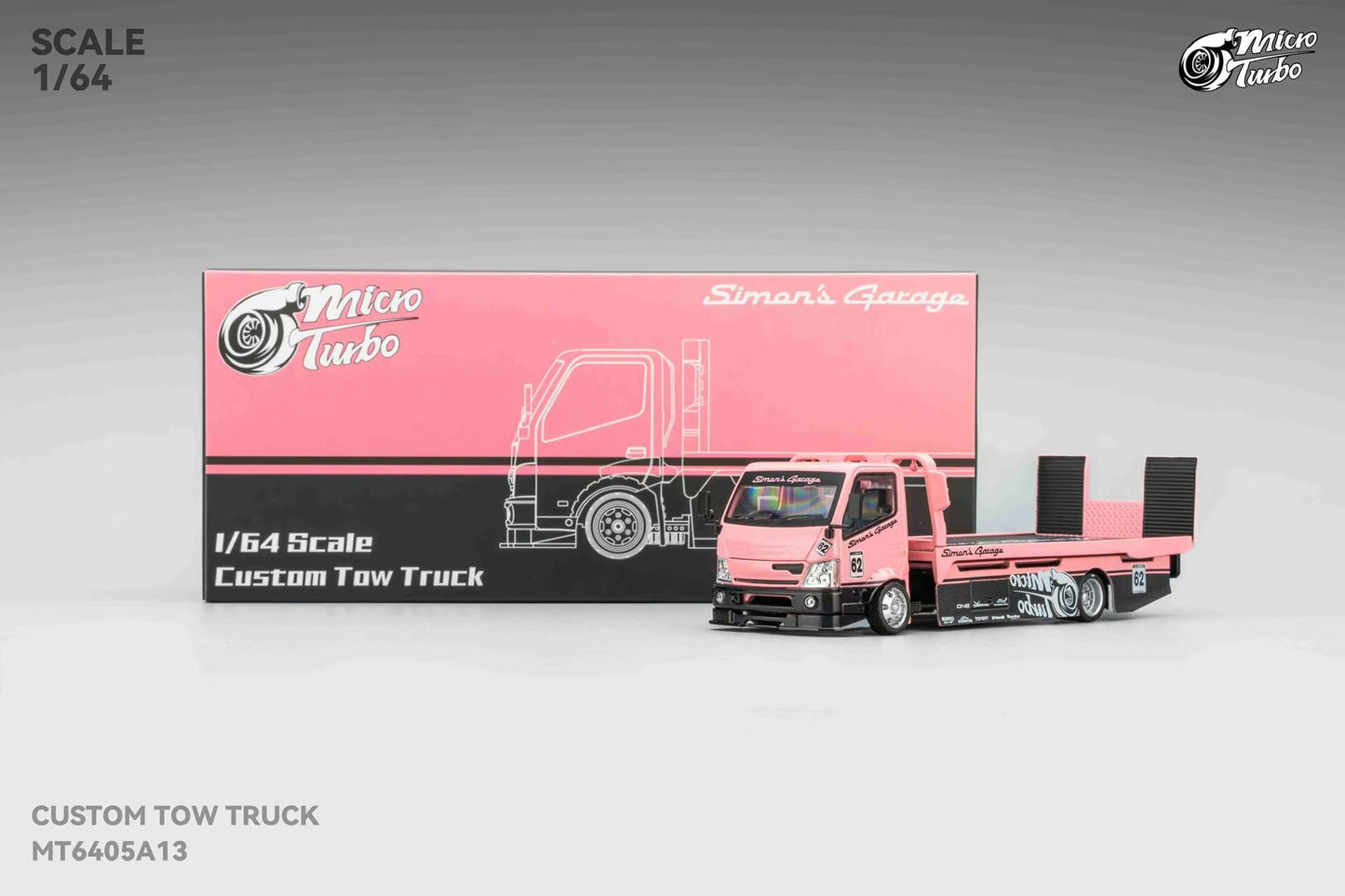 Model tow truck with packaging displaying 'Micro Turbo' branding on a gray background