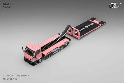 Model of a pink tow truck with an open cargo area on a gray background