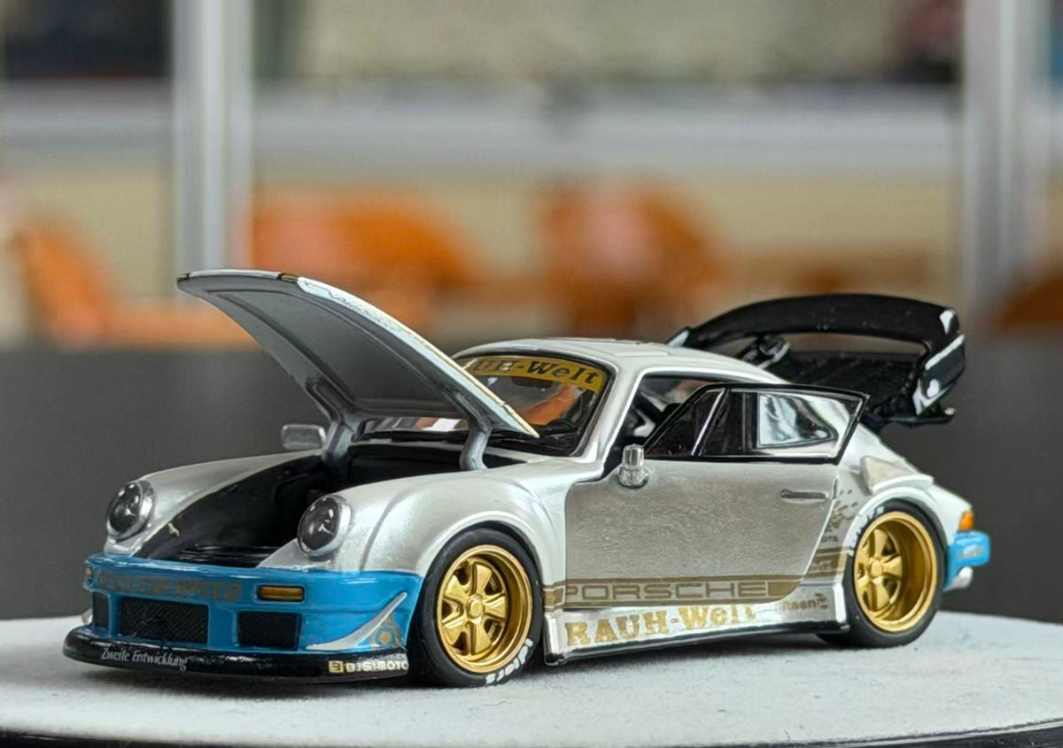 PGM 1:64 RWB Porsche 930 diecast model in pearl white with opening hood and doors, blue bumpers, gold wheels and black rear wing