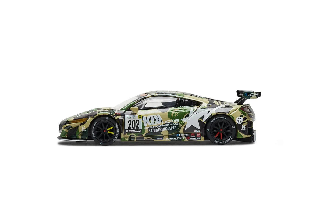 Camouflage-patterned race car with "202" on the side, featuring bold graphics, a large rear spoiler, and red-accented wheels, exuding a sleek, dynamic vibe.