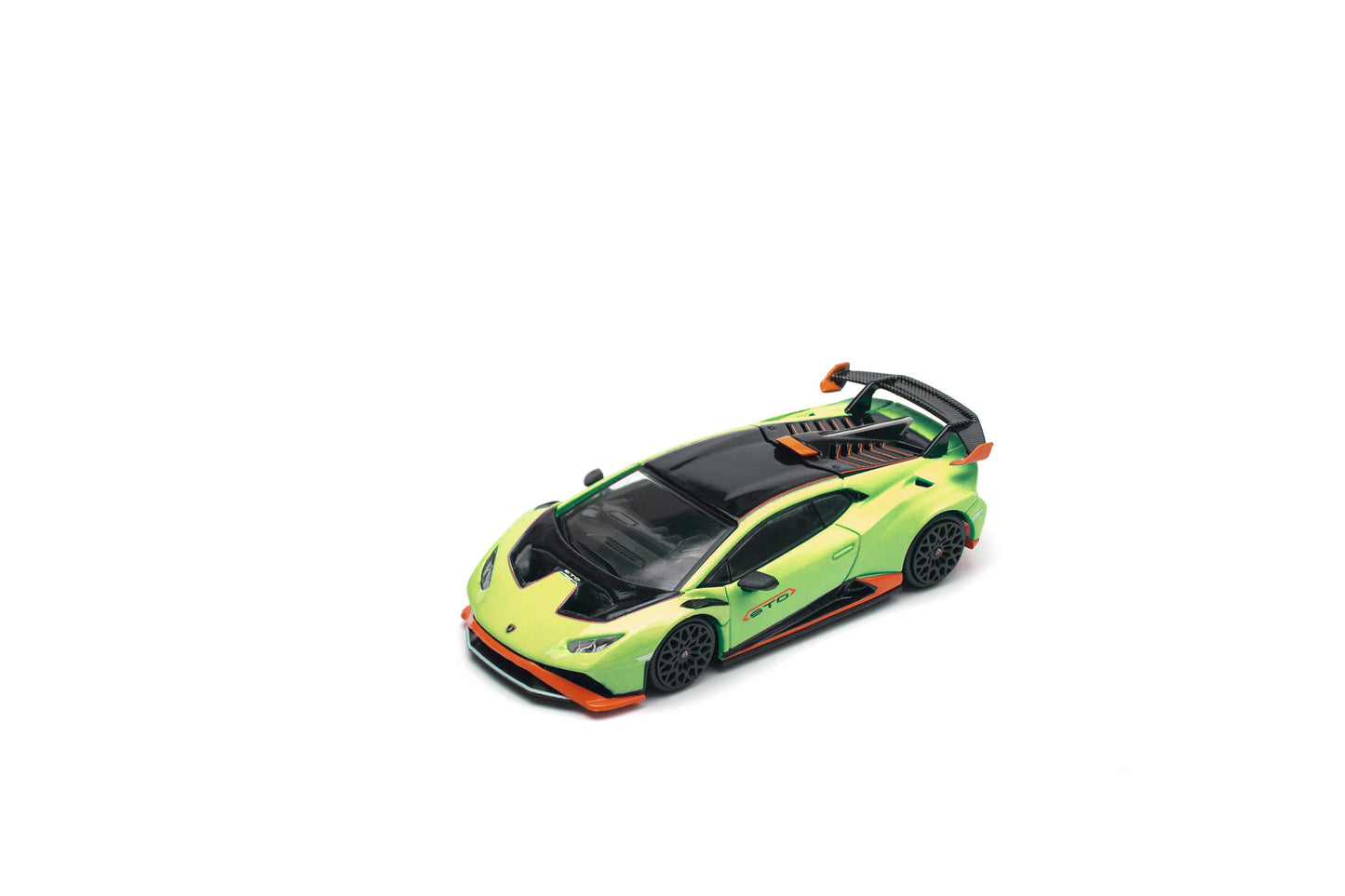 Model car with a black and green design on a white background