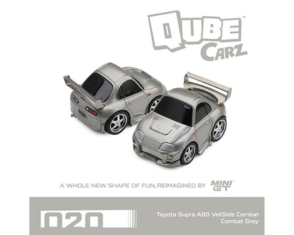 Two silver remote control toy cars shaped like a Toyota Supra A80, shown on a white background with 'Qube Carz' branding and product text.