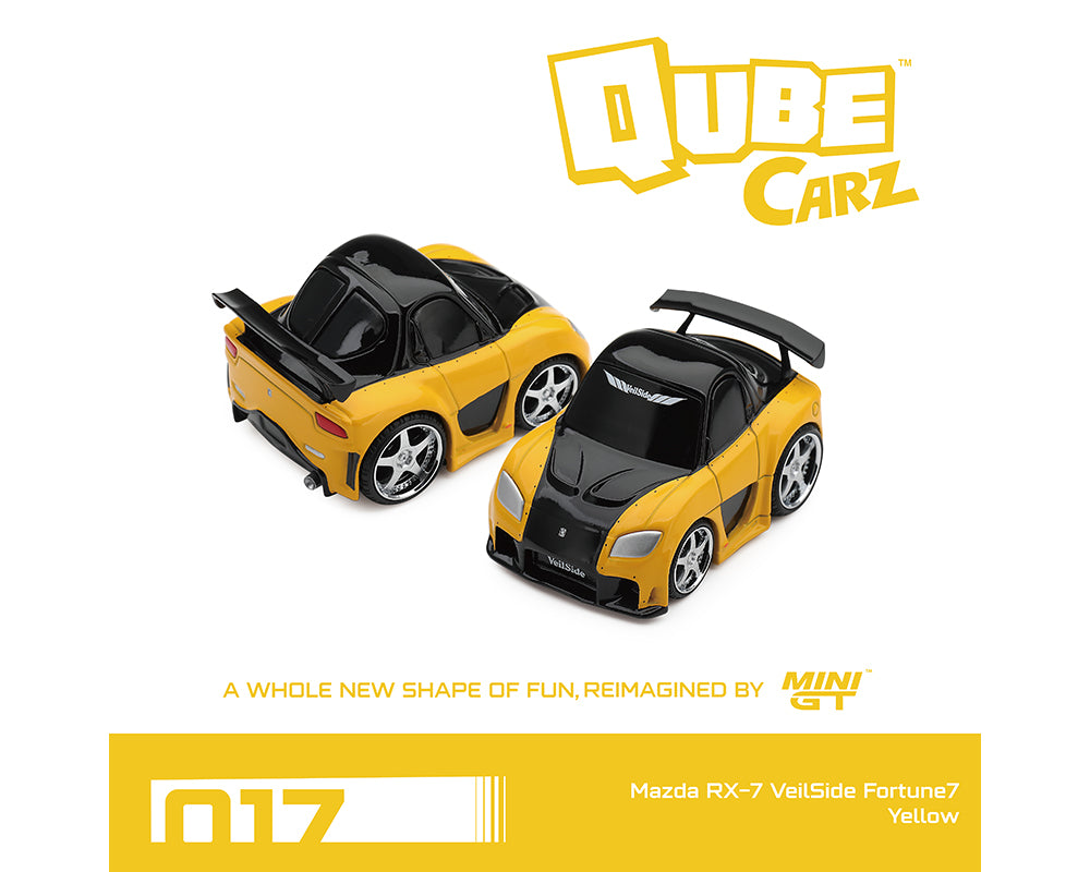 Two yellow and black toy cars from the Qube Carz Mini GT series, shown on a white background with yellow branding and text.