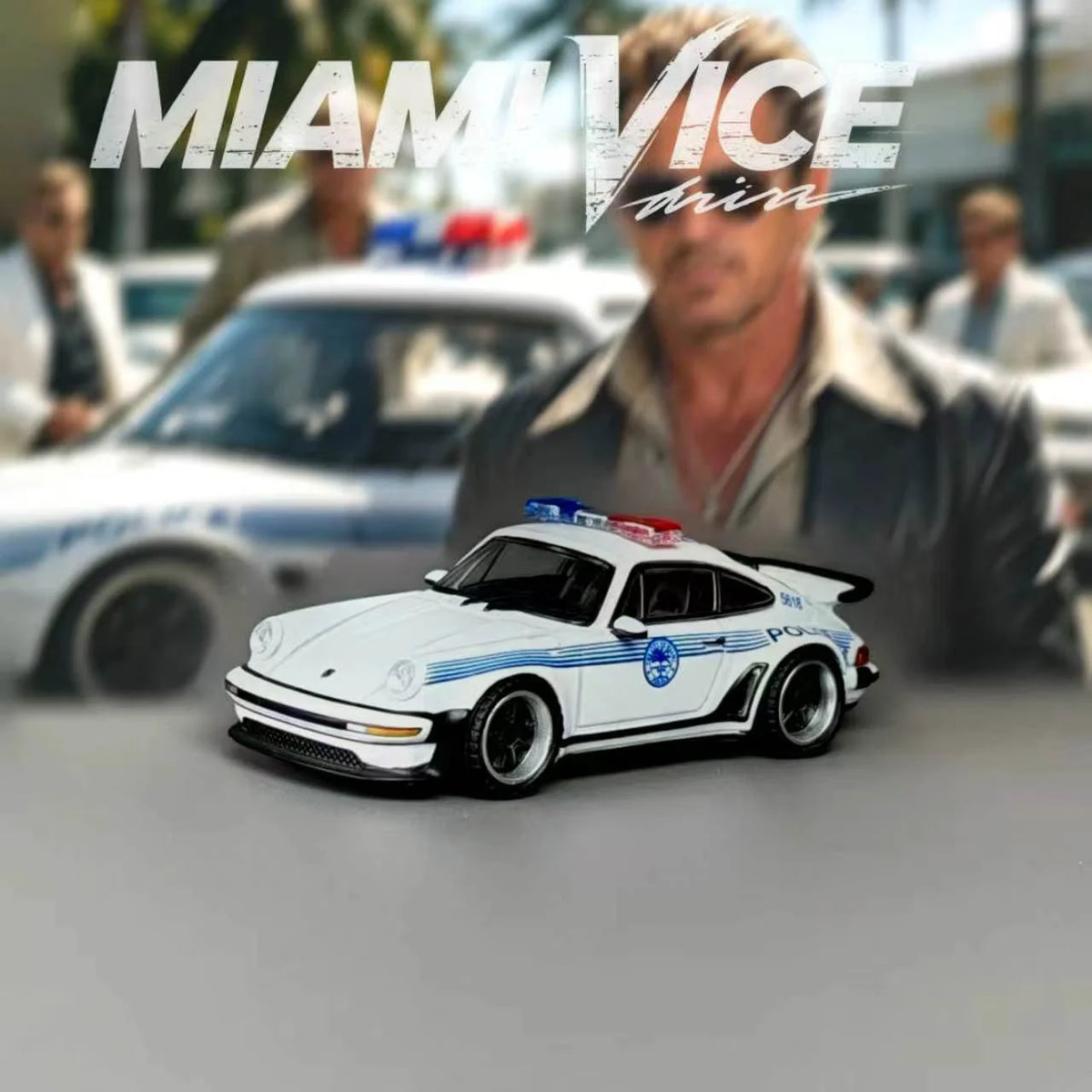 RHINO 1:64 Porsche 911 RWB 930 Miami Vice Police Car Diecast Model in White with Blue Police Stripes, Red and Blue Emergency Lights, Black Wheels and Rear Spoiler, Miami Vice Themed Background.