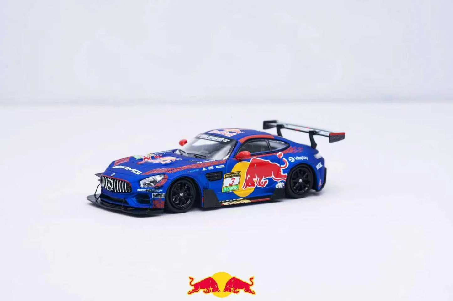 Model car with Red Bull logo on a white background