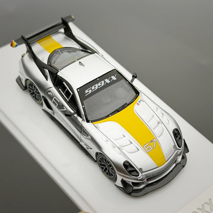 Model car with '599XX' and '67' branding on a gray background