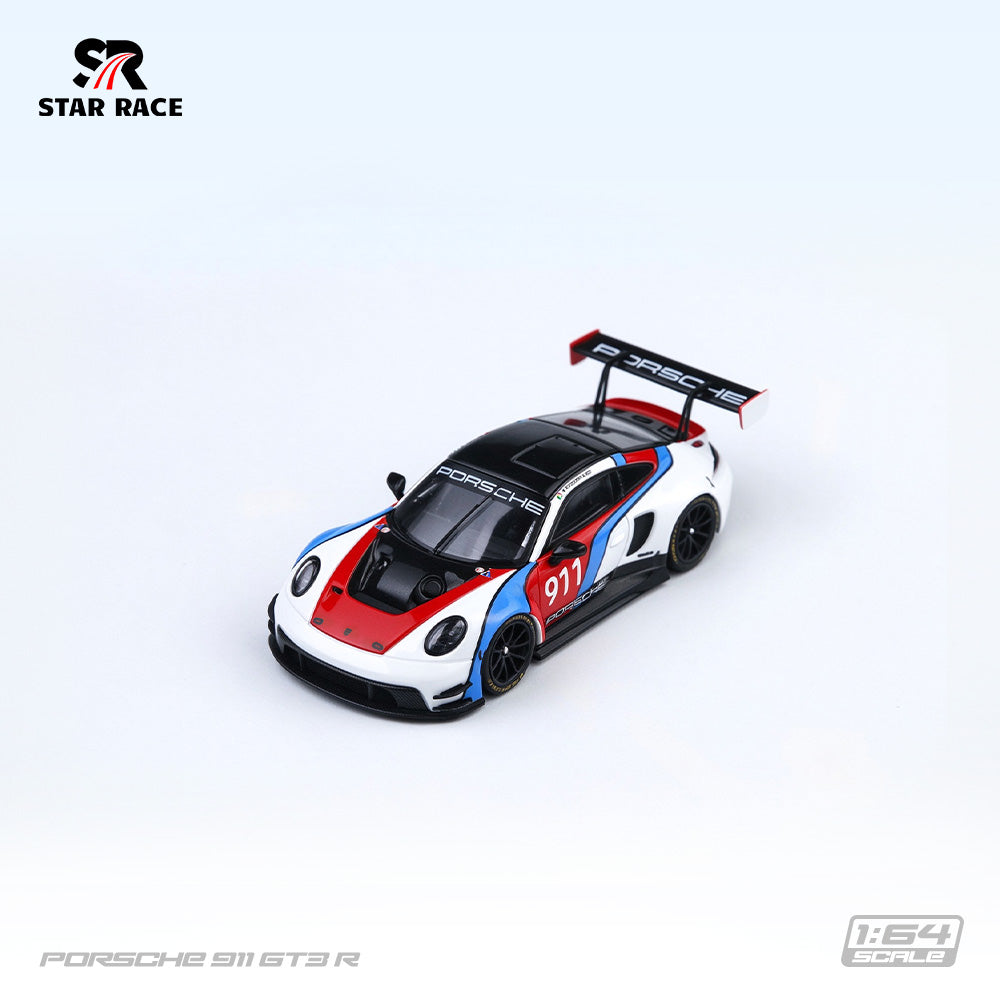 STAR RACE 1:64 Porsche 911 GT3 R #911 White Red and Blue Racing Livery Diecast Model Car High Angle Front Three Quarter View Featuring Black Racing Wheels, Carbon Fiber Hood, Widebody Aerodynamics and Large Rear Wing SR64056.