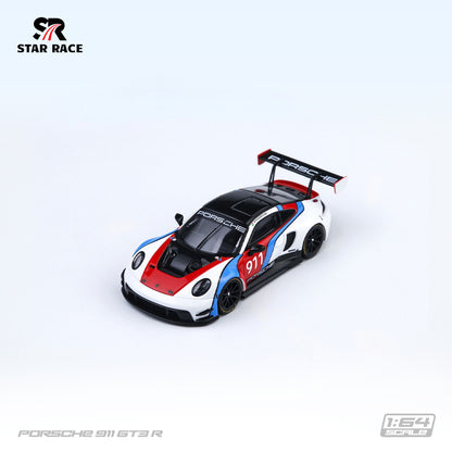 STAR RACE 1:64 Porsche 911 GT3 R #911 White Red and Blue Racing Livery Diecast Model Car High Angle Front Three Quarter View Featuring Black Racing Wheels, Carbon Fiber Hood, Widebody Aerodynamics and Large Rear Wing SR64056.
