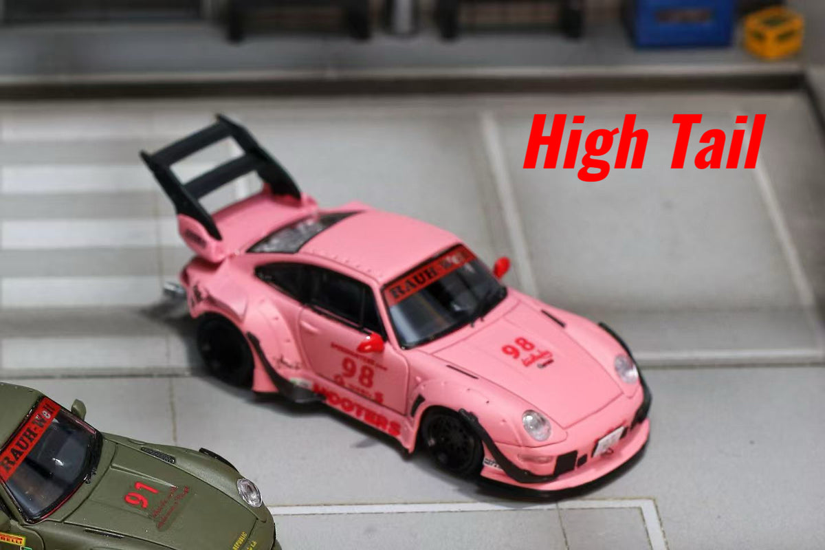 A pink diecast model sports car with a large rear spoiler, shown on a miniature street scene. The car features red and black racing decals, including the number 98 and 'HOOTERS' on the side.