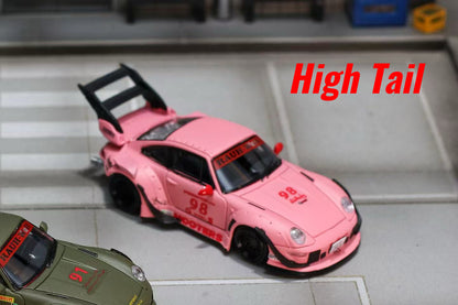 A pink diecast model sports car with a large rear spoiler, shown on a miniature street scene. The car features red and black racing decals, including the number 98 and 'HOOTERS' on the side.