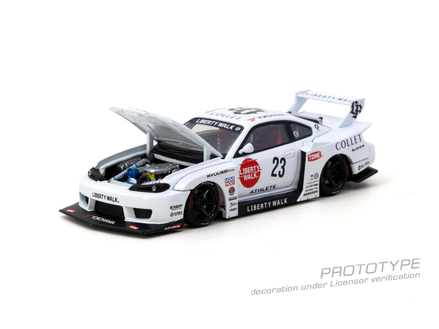 Model car with open hood on a white background