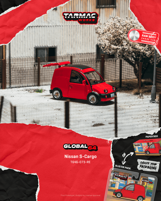 Red model car on a snowy ground with Tarmac Works branding.