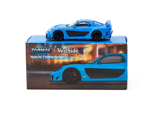 Blue model car on its packaging with Tarmac Toys branding