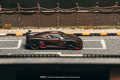 Model car on a miniature race track with a blurred background