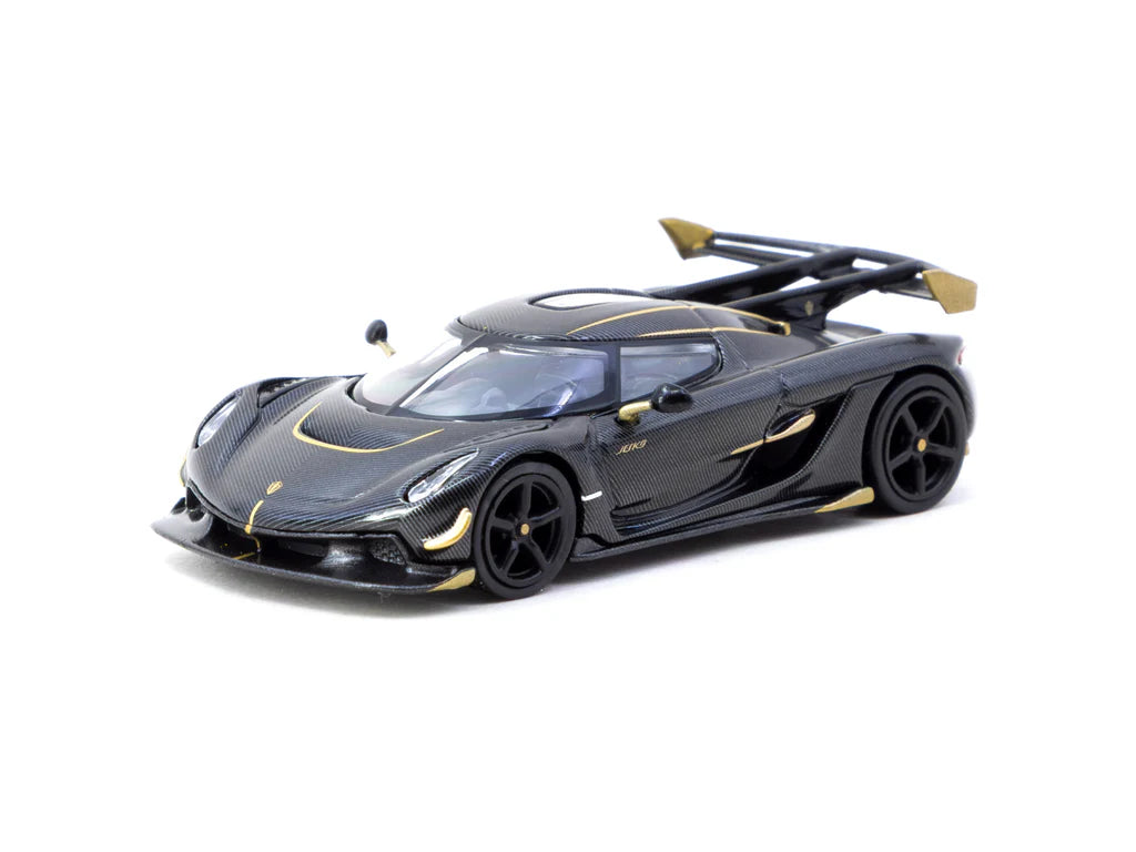 Black and gold sports car model on a white background