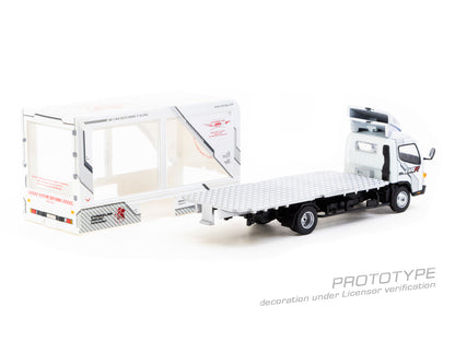 Model truck with a flatbed trailer on a white background