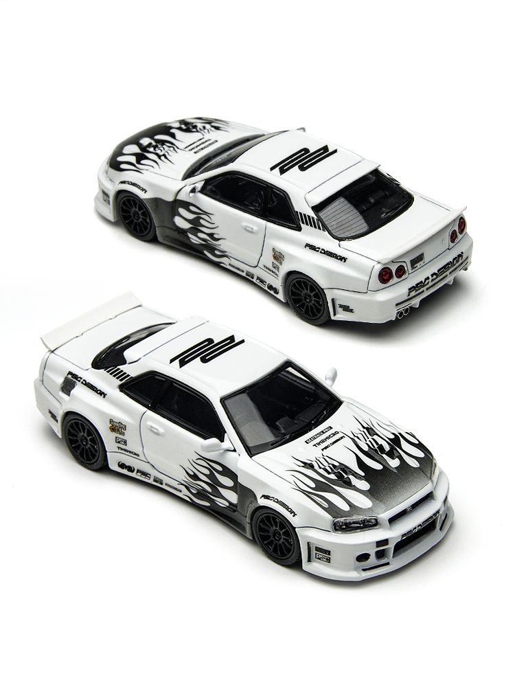 Two white model cars with black flame designs on a white background