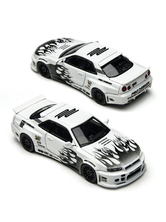 Two white model cars with black flame designs on a white background