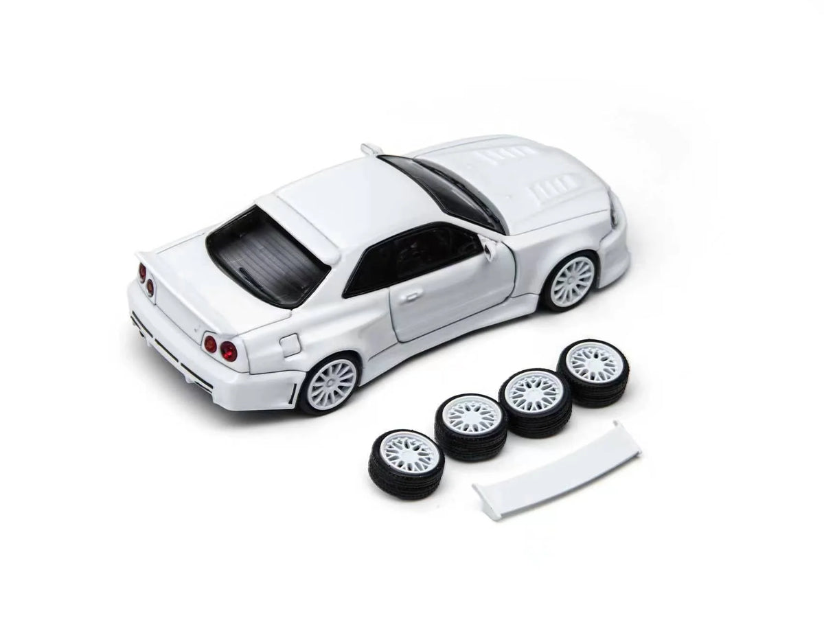 White model car with four wheels on a white background