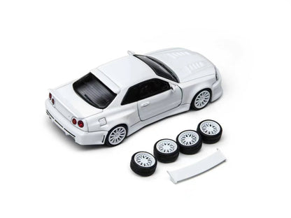 White model car with four wheels on a white background