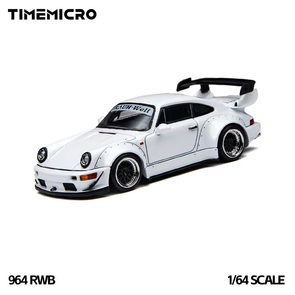 TIME MICRO 1:64 Porsche 911 964 RWB Rauh-Welt White diecast model TM648502, front three-quarter view featuring white paint, black multi-spoke wheels with polished rims, riveted widebody fender flares, lowered stance, black front splitter, and large rear wing.