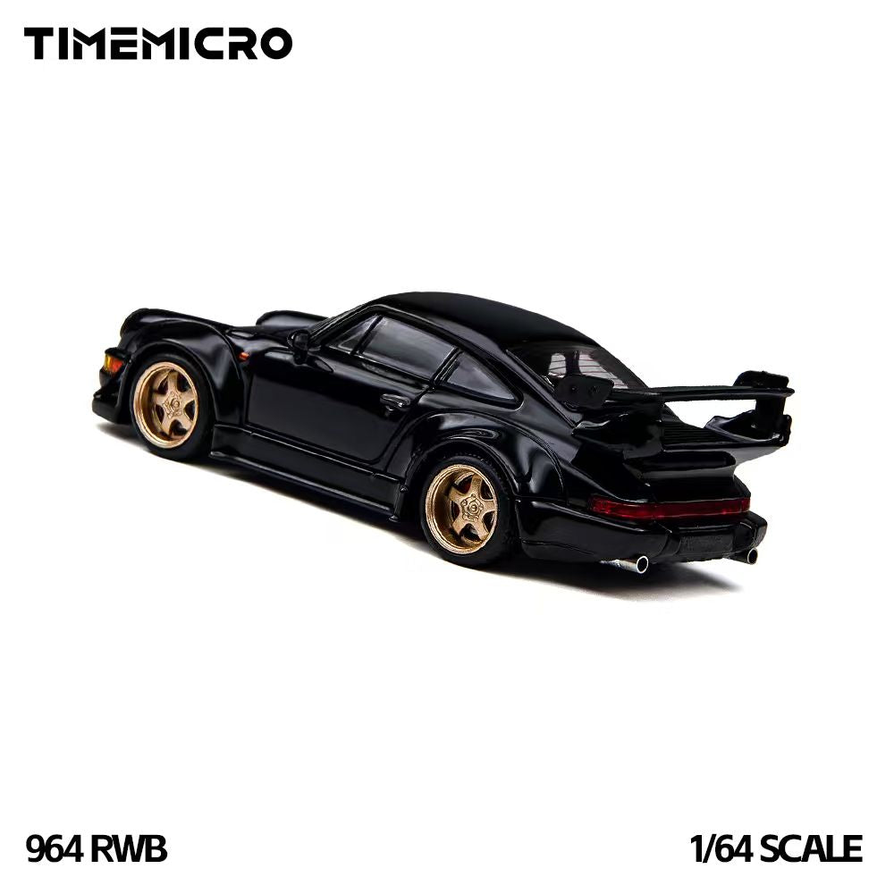 TIME MICRO 1:64 Porsche 911 964 RWB Rauh-Welt Black diecast model TM648503, rear three-quarter view featuring glossy black paint, gold five-spoke wheels, widebody fender flares, large rear wing, full-width red taillights, and dual exhaust tips.