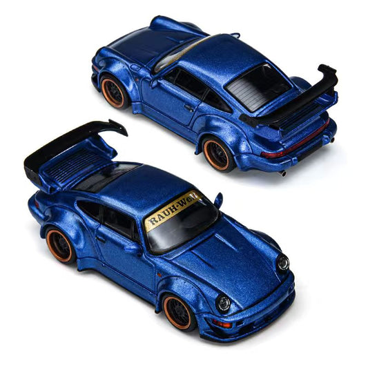 Two metallic blue diecast model cars with widebody styling, black spoilers, and orange-rimmed wheels, shown on a clean white background.