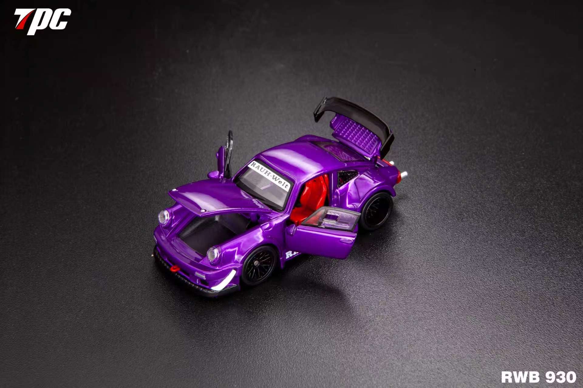Purple model car with open doors on a dark gray background