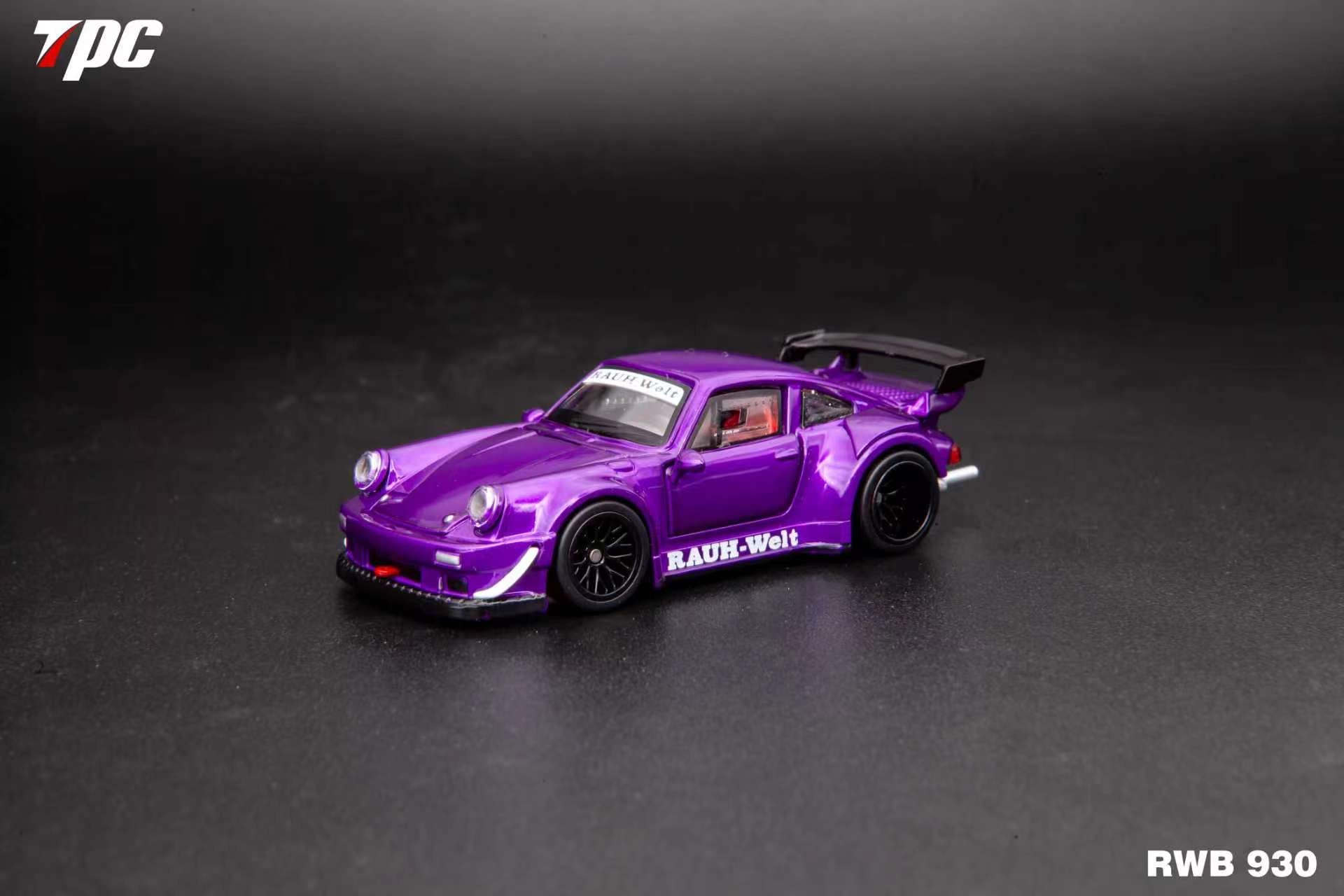Purple model car with Rauh-Welt logo on a dark background