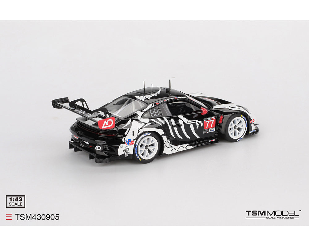 Model car with black and white design on a gray background, featuring TSM Model branding.