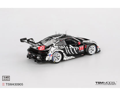 Model car with black and white design on a gray background, featuring TSM Model branding.