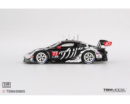 Model car with black and white design on a gray background, featuring TSM Model branding.