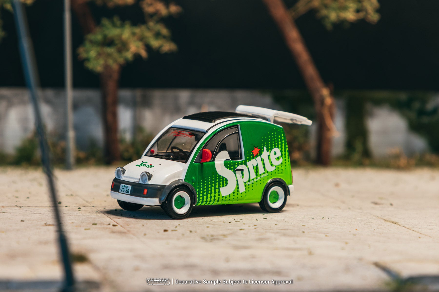 Model of a Sprite van on a sandy surface with blurred background