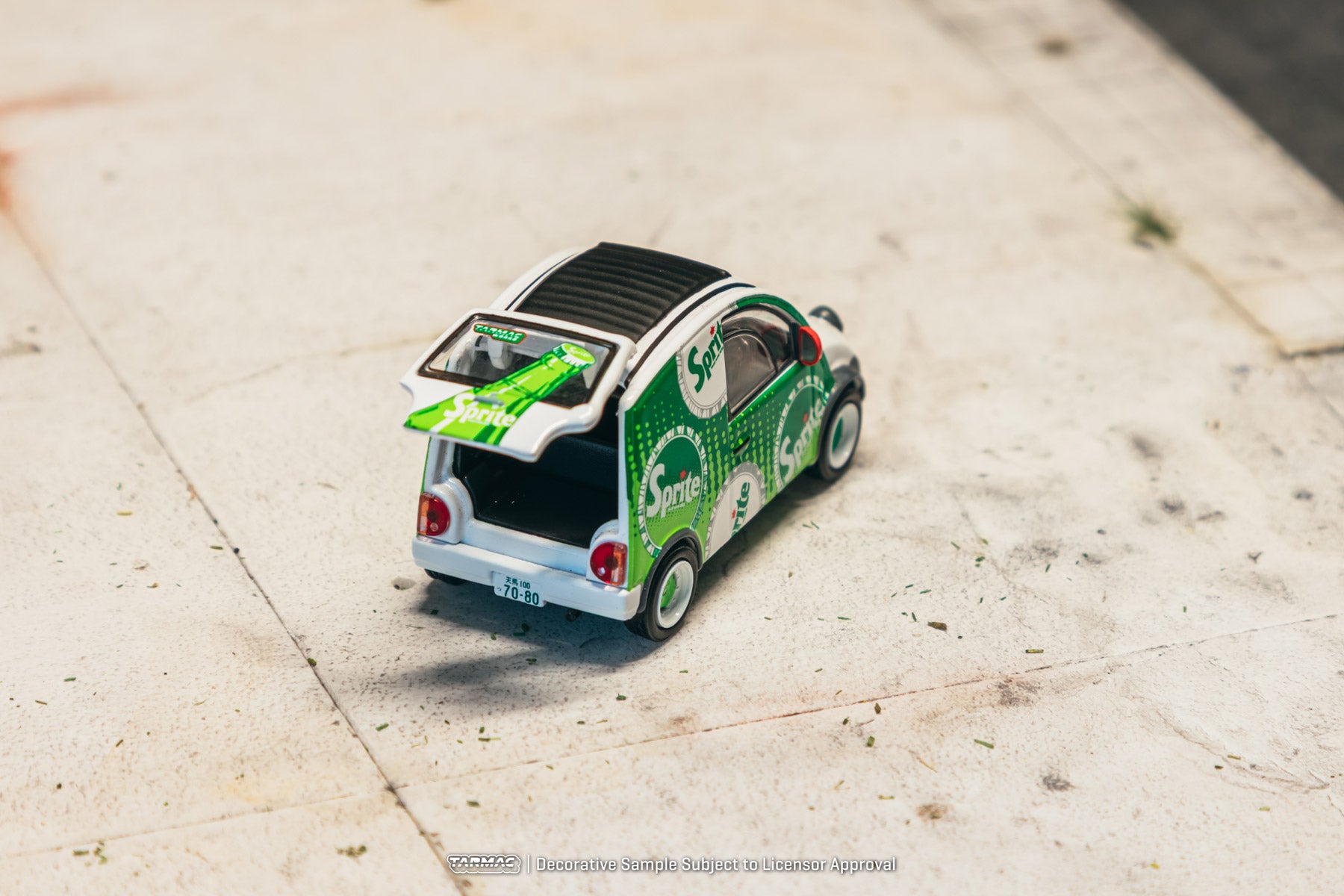 Model car with solar panel on a concrete surface
