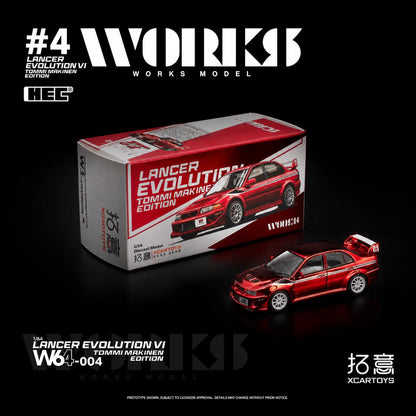 Model car and packaging with 'Works Model' branding on a black background