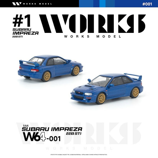 Works Model 1:64 Subaru Impreza 22B STI in World Rally Blue with gold wheels, factory body kit, hood scoop, and rear spoiler. Product code W64-001. Prototype diecast model shown from front and rear three-quarter views on a white background.