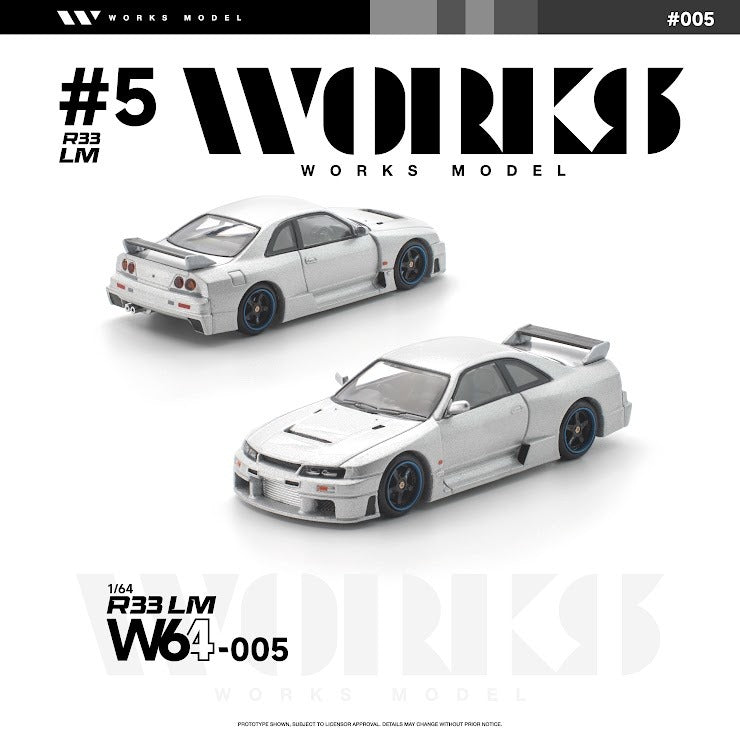 Works Model 1:64 Nissan Skyline GT-R R33 LM in metallic silver with dark blue wheels, aerodynamic widebody kit, vented hood, large rear wing, and race-inspired styling. Product code W64-005. Prototype diecast model shown from front and rear three-quarter views on a white background.