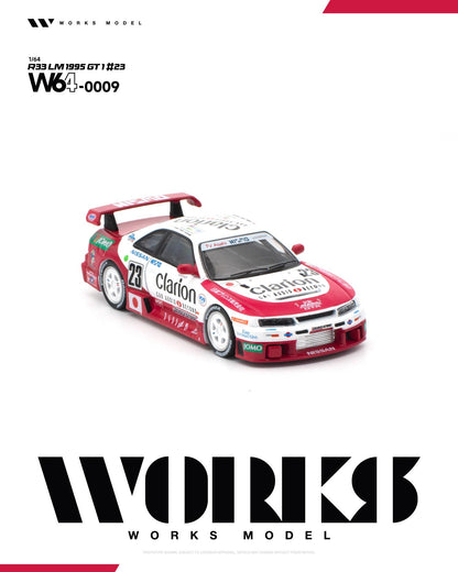 A 1:64 scale model of a 1995 Honda S2000 GT1 race car, specifically Works Model W63 LM-0009. The car features a white and red livery with prominent sponsor logos including Clarion, Honda, and Toyota, shown on a clean white background with the Works Model branding.