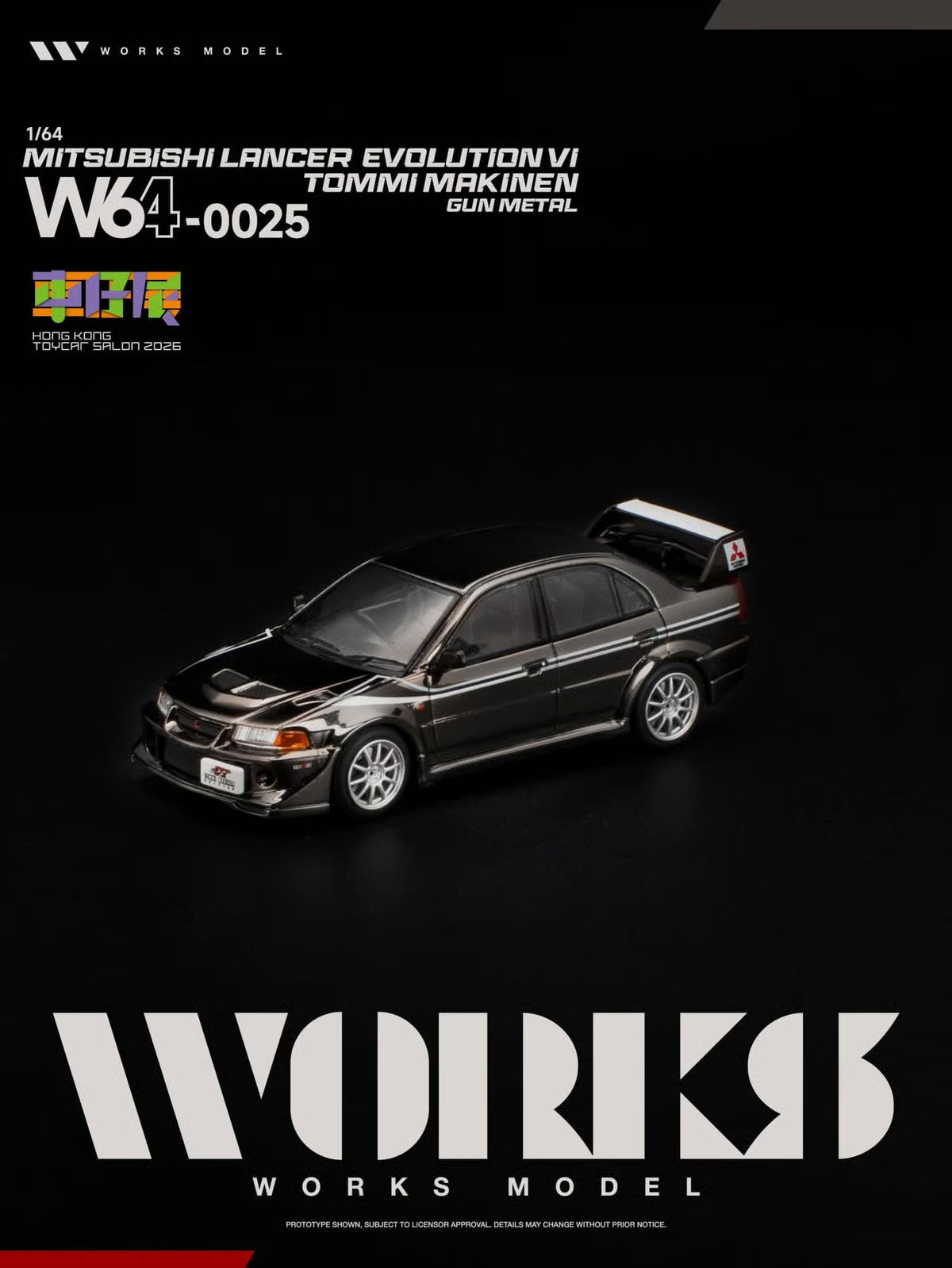 A 1:64 scale model of a black Mitsubishi Lancer Evolution VI Tommi Makinen gun metal edition, shown on a black background with WORKS MODEL branding.