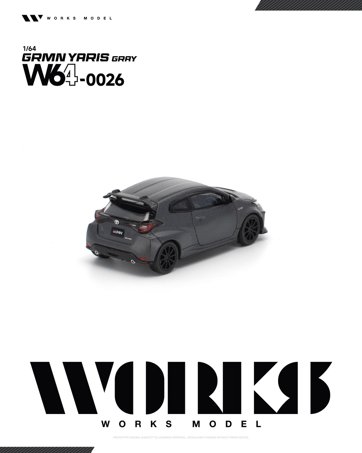 Works Model 1:64 Toyota GRMN Yaris Gray W64-0026 diecast model car rear view with carbon fiber roof, rear spoiler and black wheels