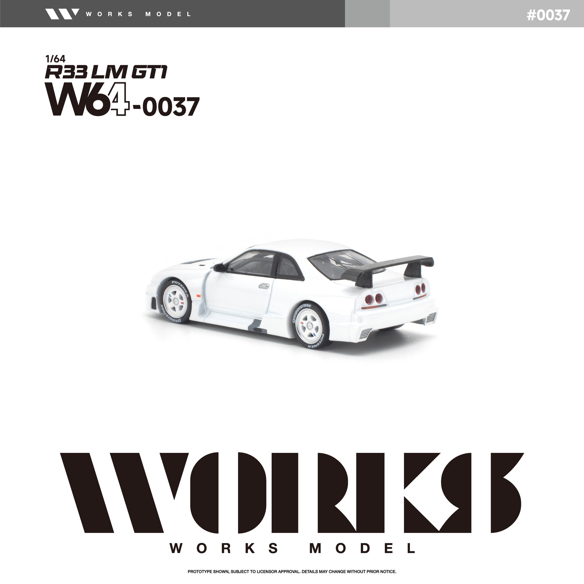 Rear three-quarter view of the Works Model 1:64 Nissan Skyline GT-R R33 LM GT1 in factory white with white wheels, aerodynamic widebody, rear diffuser, and large GT-style rear wing. Product code W64-0037. Prototype diecast model on a white background.