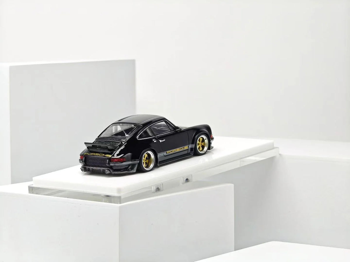 ZINCIT 1:64 Porsche 911 Singer DLS Black Diecast Model Car with Gold Wheels, Porsche Side Stripes, Rear Spoiler and Detailed Dual Exhaust – Rear Three-Quarter View