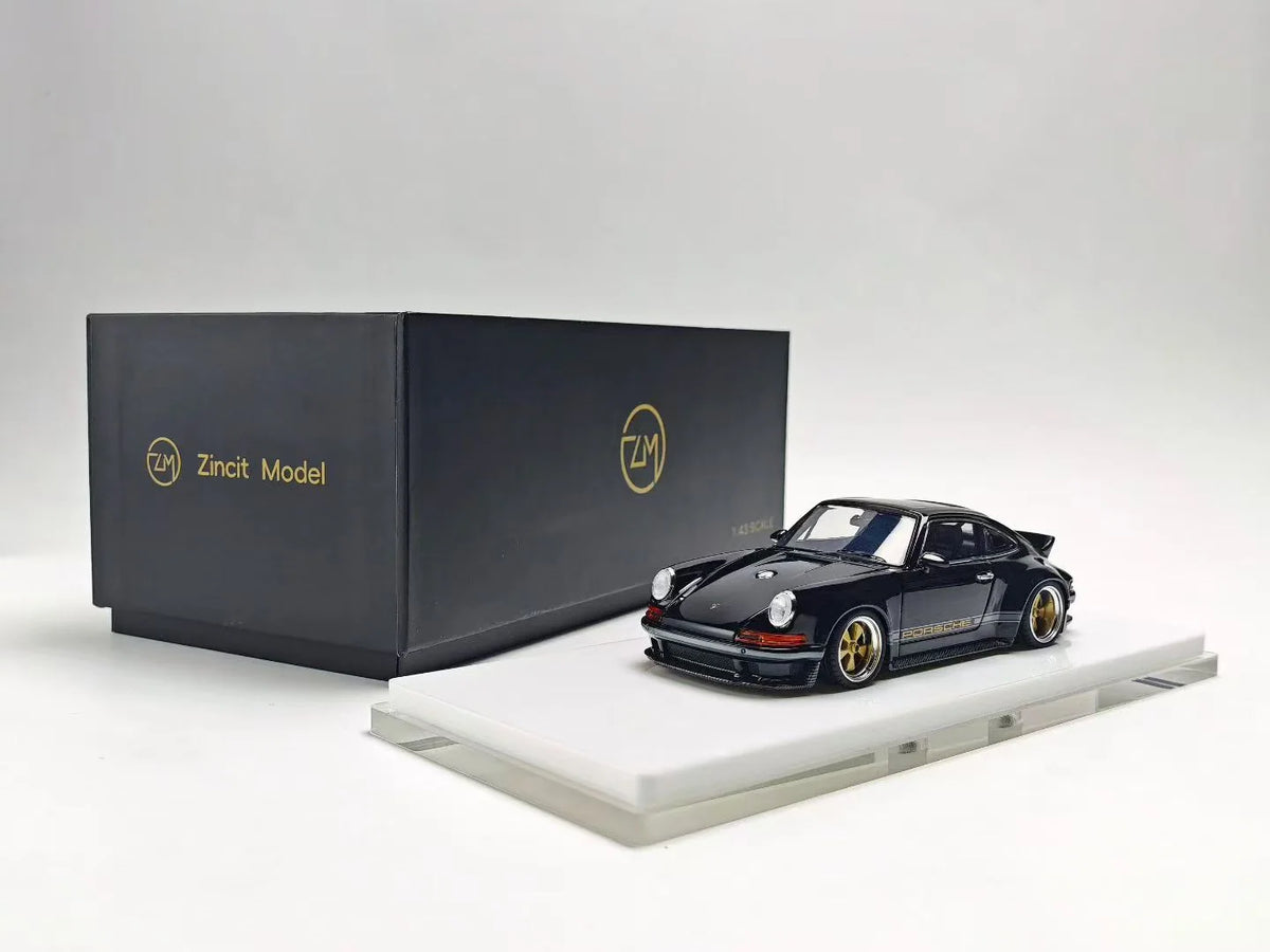 ZINCIT Model 1:64 Porsche 911 Singer DLS Black Diecast Model Car with Gold Wheels, Porsche Side Stripes, Rear Spoiler, Display Base and Original ZINCIT Model Packaging Box – Front Three-Quarter View