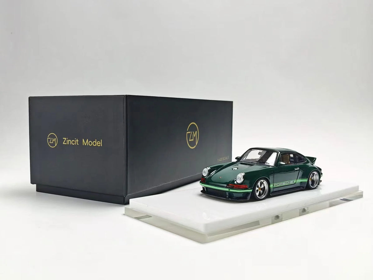 ZINCIT Model 1:64 Porsche 911 Singer DLS Dark Green Diecast Model Car with Silver Five-Spoke Wheels, Green Porsche Side Stripes, Rear Spoiler, White Display Base and Original ZINCIT Model Packaging Box – Front Three-Quarter View